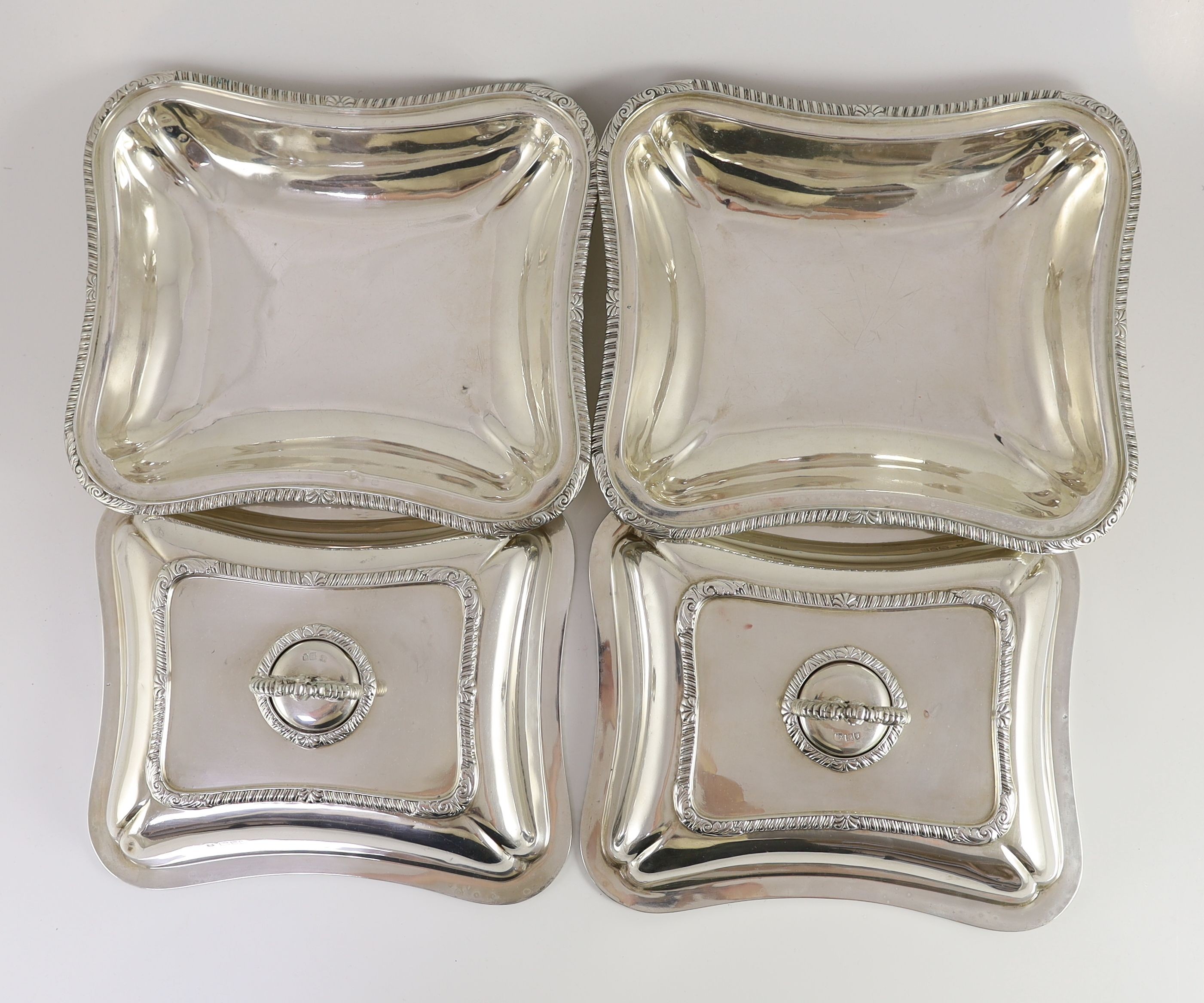 A pair of Edwardian silver tureens and cover with handles, by Daniel & John Welby